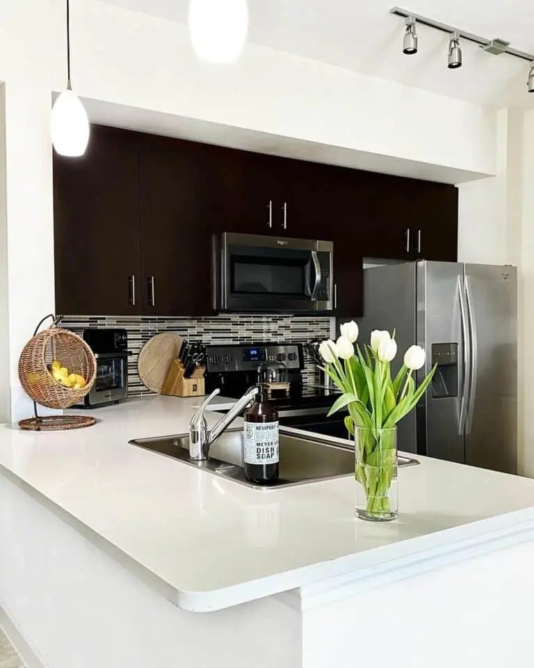 Black cabinets, white countertop