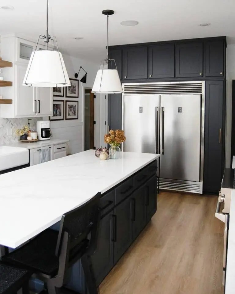 Black cabinets, white quartz counters