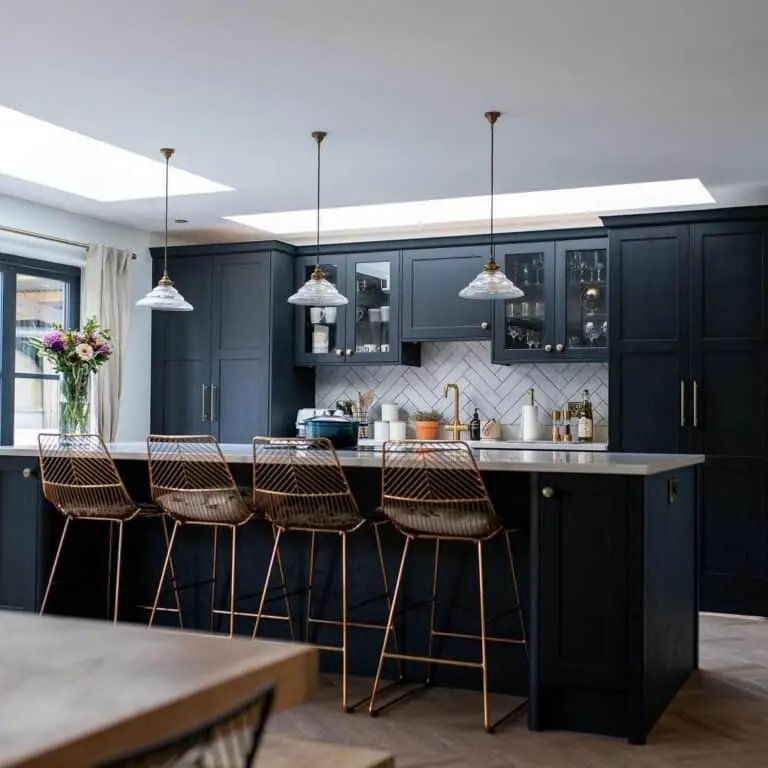 Black Cabinets with Bronze Chairs