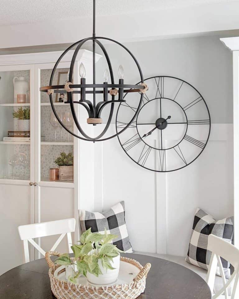 Black globe chandelier over round table