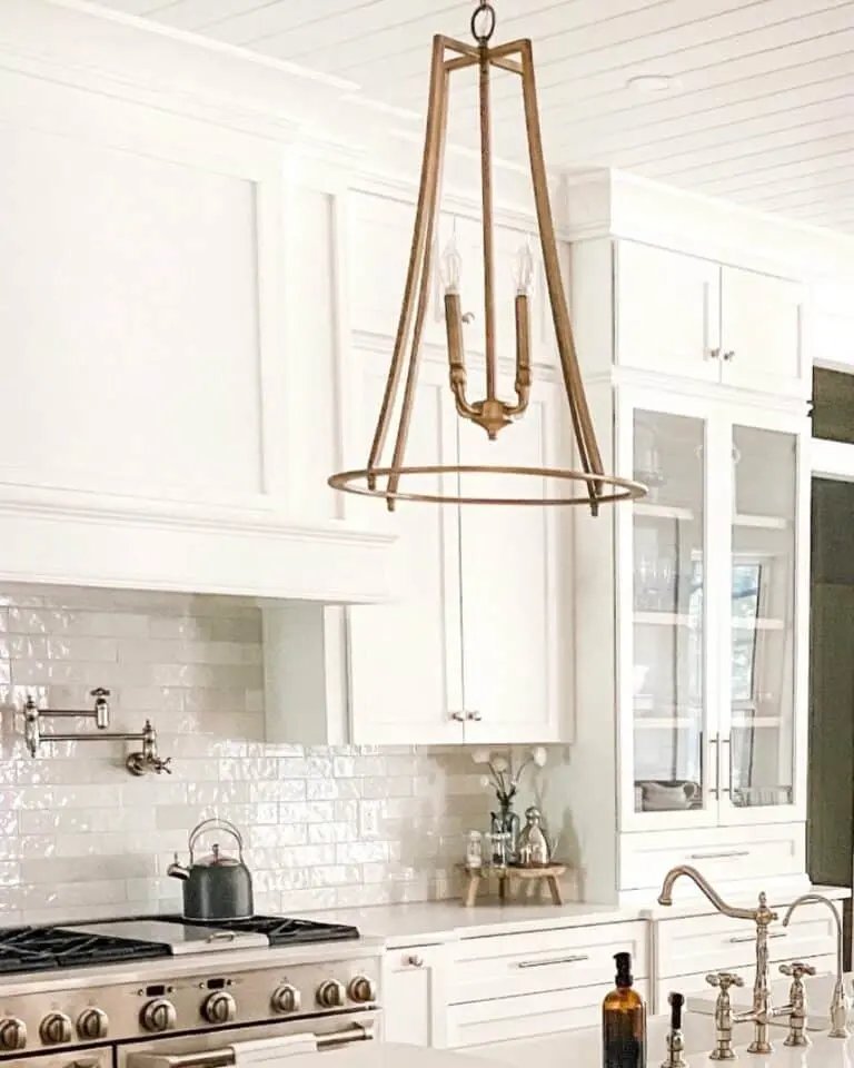 Brass Chandelier in White Kitchen