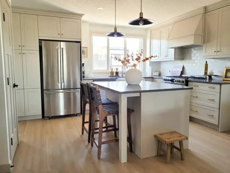 Cream Cabinets, Black Countertop