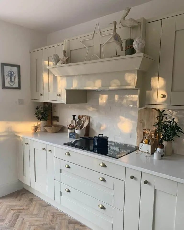 Cream cabinets, herringbone floor