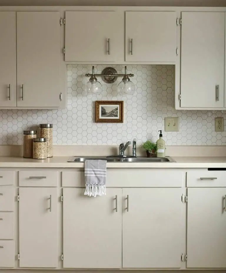 Cream cabinets with white countertop