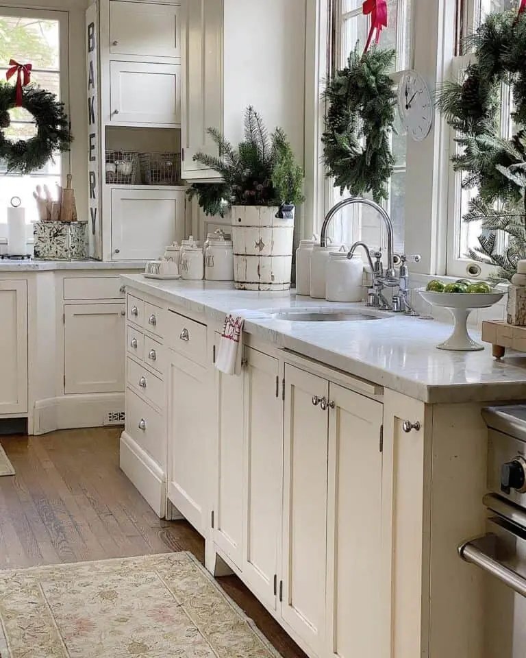 Cream cabinets with wreaths