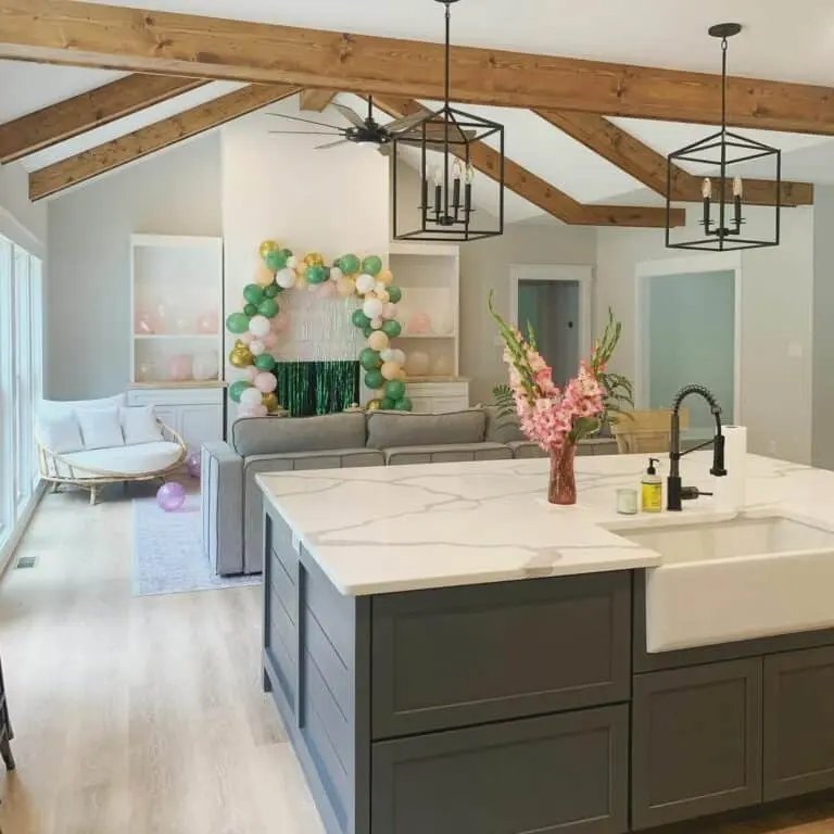 Gray cabinets white quartz geometric lamps