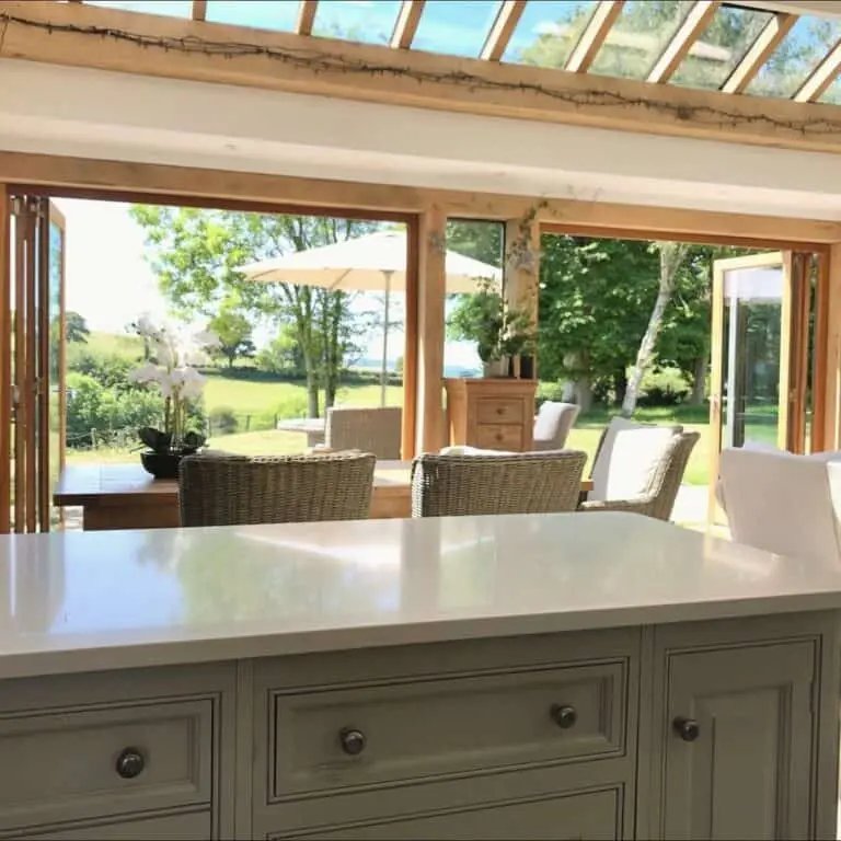 Gray Cabinets with Rattan Furnishings
