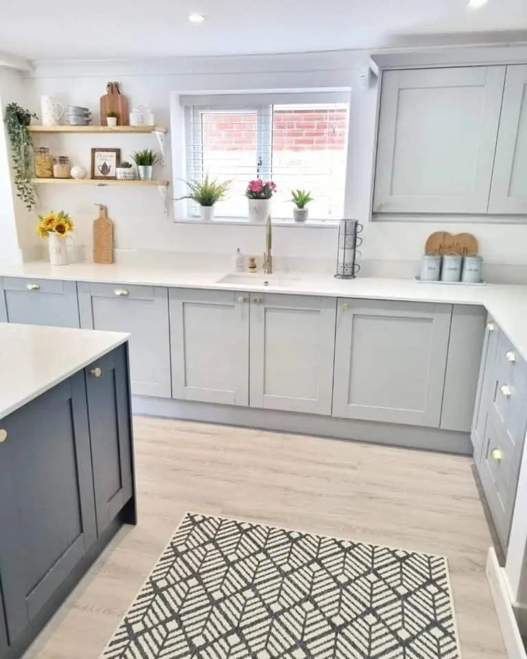 Gray cabinets, wood shelves, geometric rug