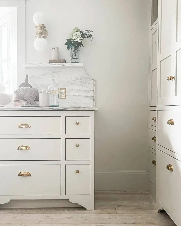 Marbled Backsplash and Sconce