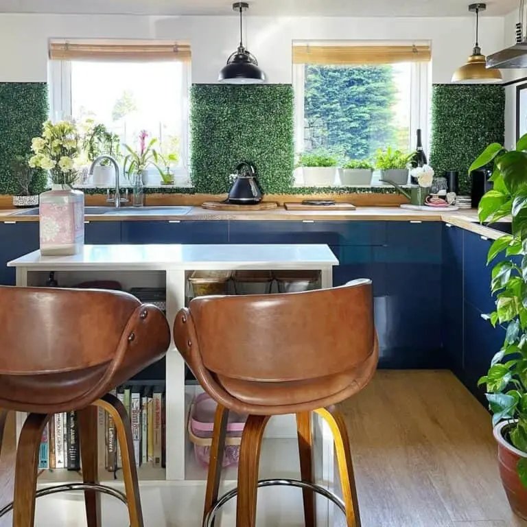 Plants, Wood, and Leather in Dark Blue Kitchen