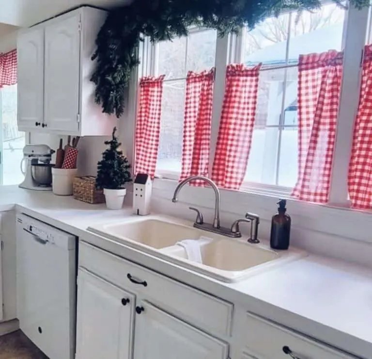Red gingham curtains and pine garland
