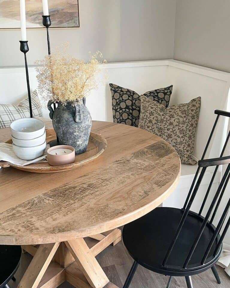 Round wooden table with built-in bench