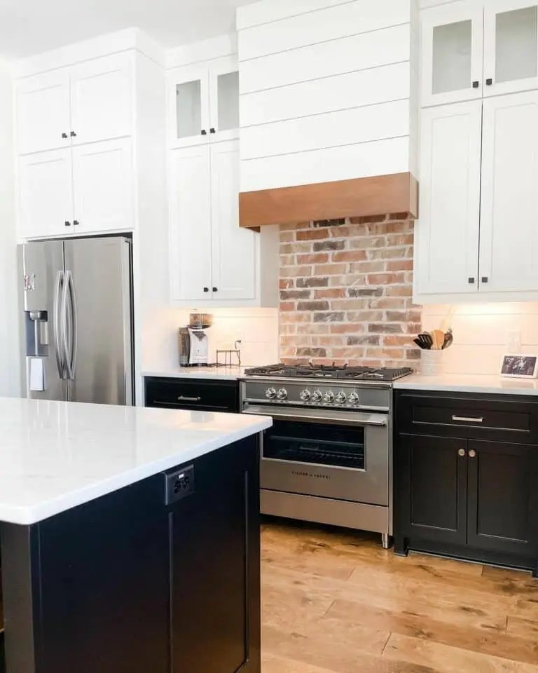 Shiplap walls, black cabinets, wood floors