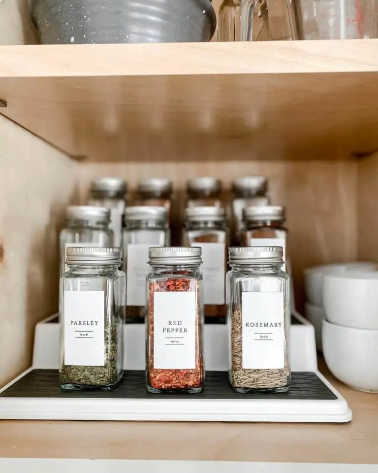 Spice Bottles on Tiered Wooden Shelves