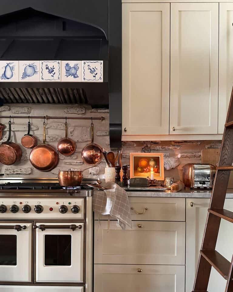 Stone Backsplash with Copper Pans