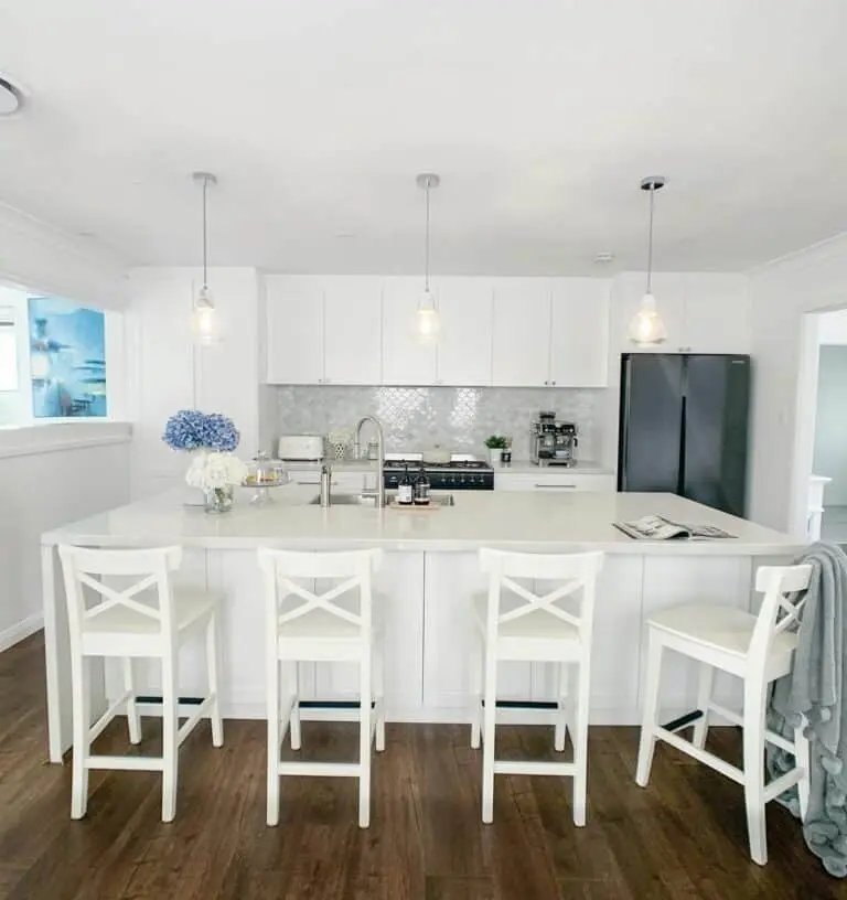 White bar stools with chrome accents