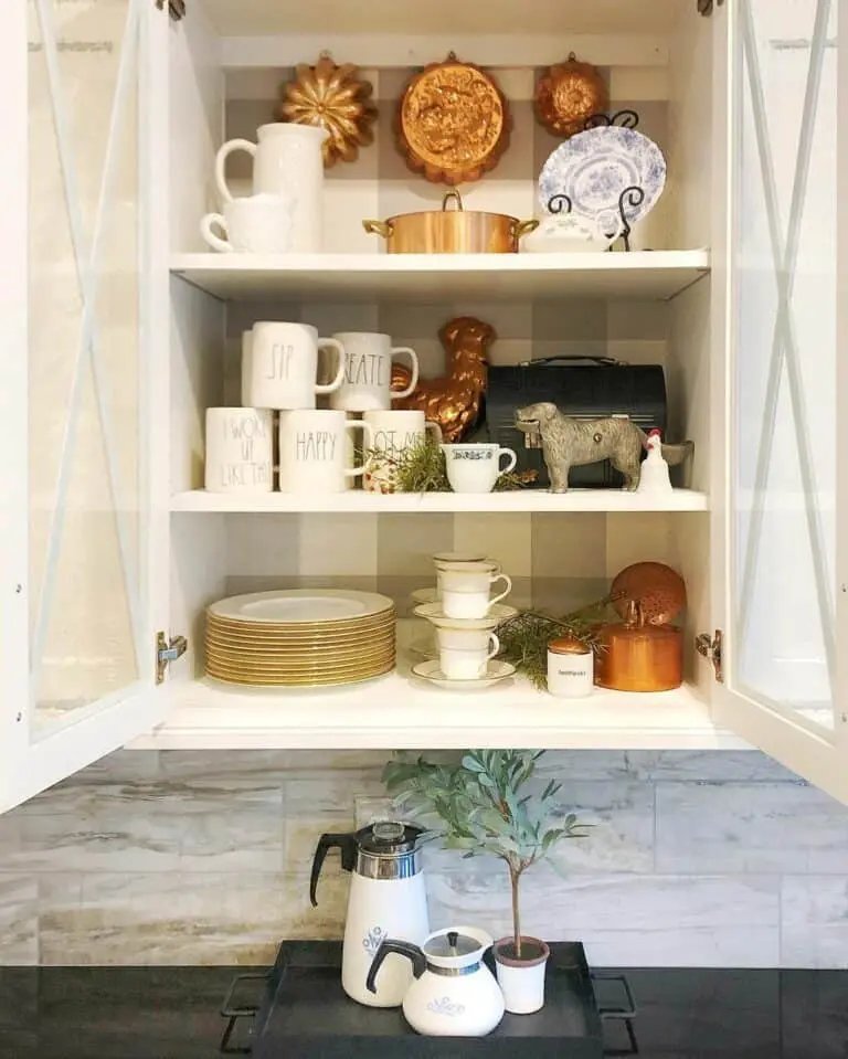 White cabinet with copper accents