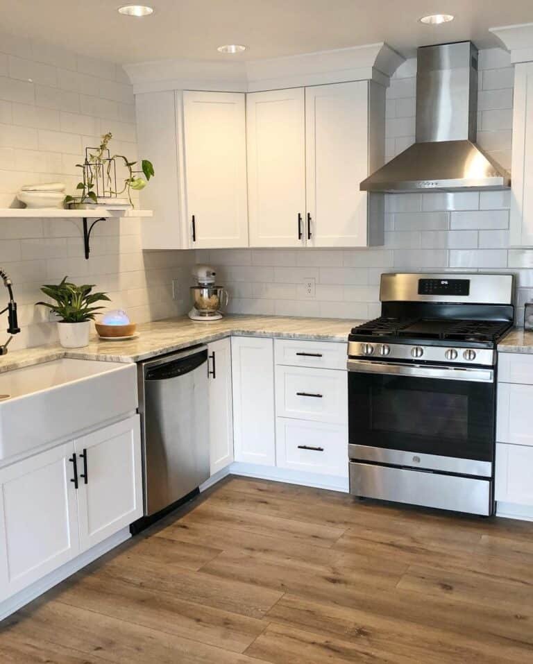 White Cabinetry with Quartzite Countertops