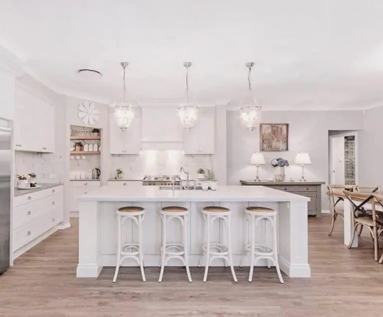 White cabinets, marble backsplash