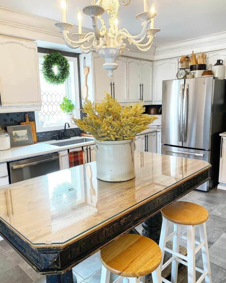 White chandelier over island
