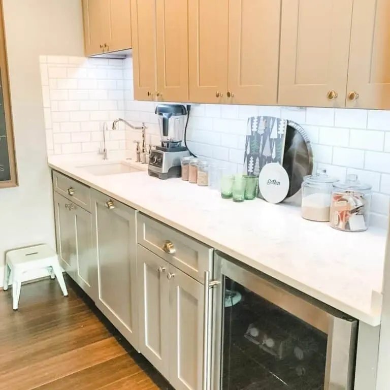 White Countertop with Silvery Knobs