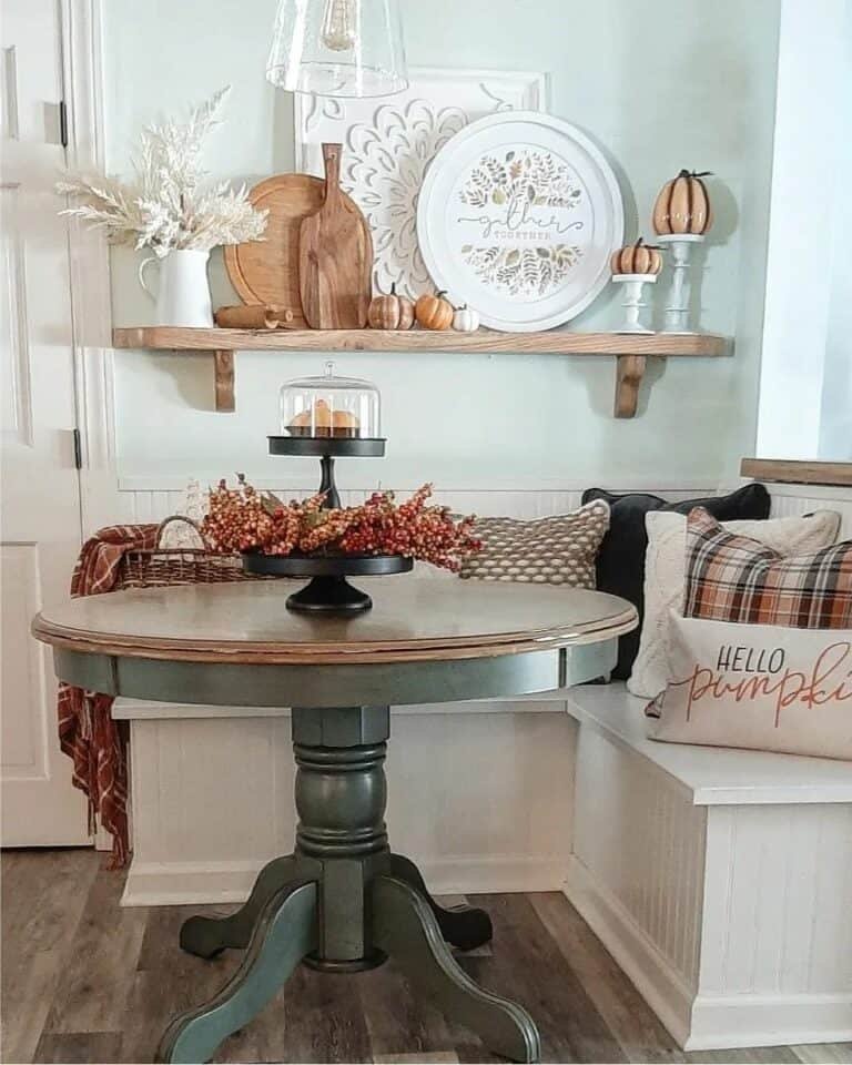 White L-shaped beadboard banquette