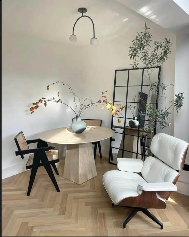 Wooden chair, mirror, herringbone floor