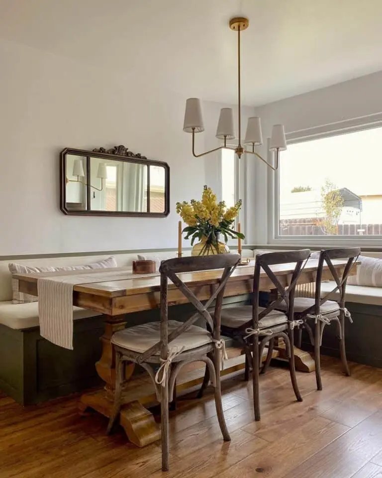 Wooden corner bench with cross-back chairs